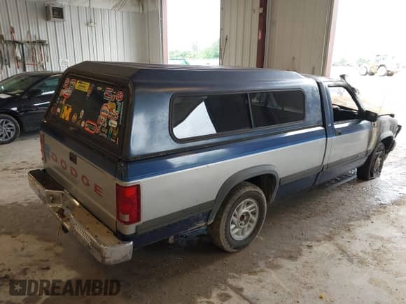 1991 Dodge Dakota with VIN 1B7FL26Y7MS253725, listed as a IAAI auction lot 43037024 with Not provided miles and . Bid and sale history available at DreamBid. Image 4.