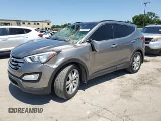 ✅ 2015 Hyundai Santa Fe • VIN: 5XYZW4LA6FG263629 • Лот: 57553744. Опубликован ранее на Copart с пробегом 75 409 миль. Бесплатный доступ к архиву аукционных продаж из США и подробный отчёт об истории автомобиля на DreamBid. Изображение 1.