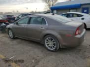 ✅ 2012 Chevrolet Malibu LTZ • VIN: 1G1ZE5EU7CF157570 • Lot: 82427004. Listed on Copart with 152,932 mi. Free auction sales archive from the USA and detailed vehicle history report at DreamBid. Image 2.