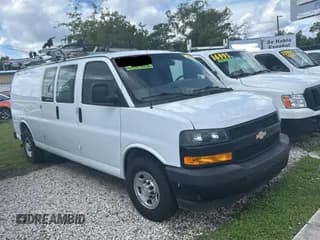 ✅ 2018 Chevrolet Express Cargo • VIN: 1GCWGBFG0J1321487 • Lot: 80459925. Listed on Copart with 148,159 mi. Free auction sales archive from the USA and detailed vehicle history report at DreamBid. Image 1.