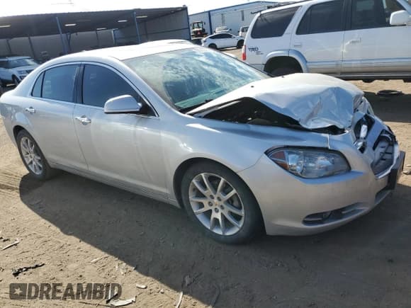 ✅ 2012 Chevrolet Malibu LTZ • VIN: 1G1ZG5E79CF101361 • Lot: 69943304. Listed on Copart with 154,022 mi. Free auction sales archive from the USA and detailed vehicle history report at DreamBid. Image 4.