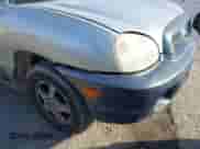 2004 Hyundai Santa Fe GLS z VIN KM8SC13EX4U799955, wystawiony jako IAAI lot #41240442 z przebiegiem 281 394 mil mil oraz . Historia ofert i sprzedaży dostępna na DreamBid. Obrazek 6.