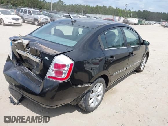 ✅ 2011 Nissan Sentra SL • VIN: 3N1AB6AP5BL724014 • Lot: 42086084. Listed on IAAI with 167,857 mi. Free auction sales archive from the USA and detailed vehicle history report at DreamBid. Image 4.