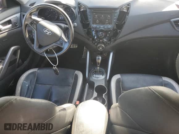 ✅ 2015 Hyundai Veloster Turbo R-Spec • VIN: KMHTC6AE6FU216997 • Lot: 82205865. Listed on Copart with 181,550 mi. Free auction sales archive from the USA and detailed vehicle history report at DreamBid. Image 8.