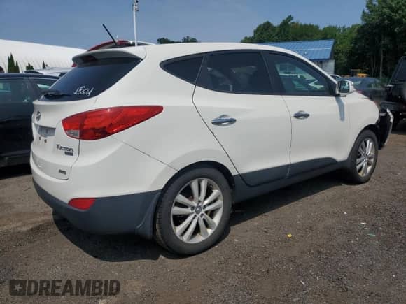 2013 Hyundai Tucson Limited with VIN KM8JUCAC4DU712511, listed as a Copart auction lot 67766825 with 121,977 mi miles and Salvage title. Bid and sale history available at DreamBid. Image 3.