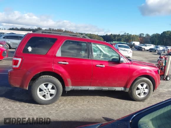 ✅ 2009 Ford Escape XLT • VIN: 1FMCU03789KA07673 • Lot: 43577512. Listed on IAAI with 197,812 mi. Free auction sales archive from the USA and detailed vehicle history report at DreamBid. Image 13.