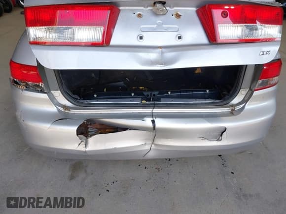 ✅ 2004 Honda Accord DX • VIN: 1HGCM55184A138824 • Lot: 43011734. Listed on IAAI with 216,840 mi. Free auction sales archive from the USA and detailed vehicle history report at DreamBid. Image 12.