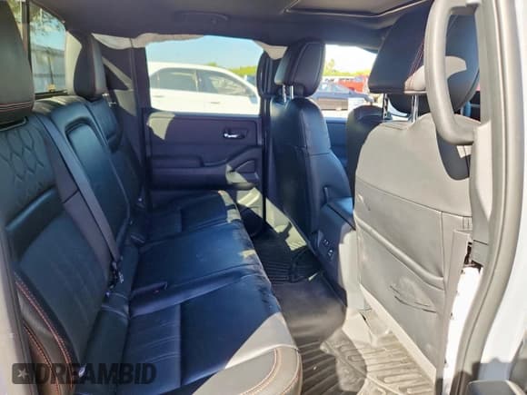 ✅ 2024 Nissan Frontier Pro-X • VIN: 1N6ED1EJ0RN674759 • Lot: 90909865. Listed on Copart with 5,392 mi. Free auction sales archive from the USA and detailed vehicle history report at DreamBid. Image 10.