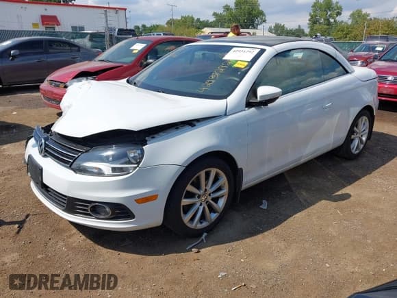 ✅ 2016 Volkswagen Eos Komfort • VIN: WVWBW8AH7GV000505 • Lot: 42931292. Listed on IAAI with 96,758 mi. Free auction sales archive from the USA and detailed vehicle history report at DreamBid. Image 2.