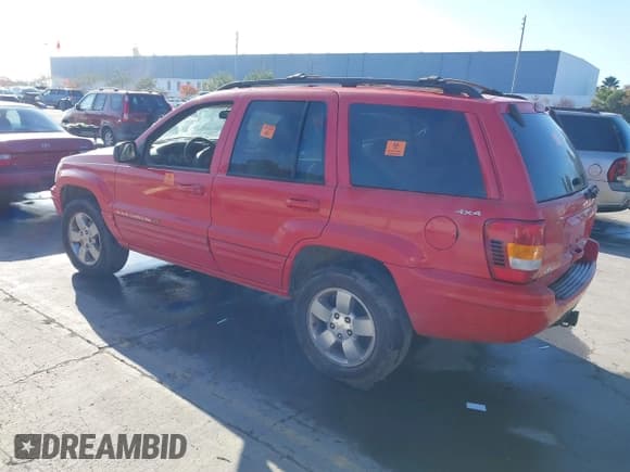 ✅ 2001 Jeep Grand Cherokee Limited • VIN: 1J4GW58N01C613272 • Lot: 43892757. Listed on IAAI with Not provided. Free auction sales archive from the USA and detailed vehicle history report at DreamBid. Image 3.