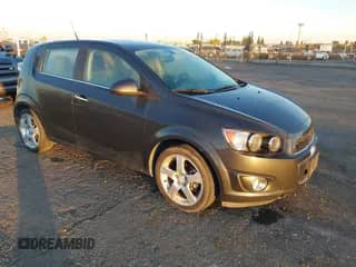 2014 Chevrolet Sonic LTZ with VIN 1G1JF6SB0E4153118, listed as a IAAI auction lot 43486053 with 98,138 mi miles and . Bid and sale history available at DreamBid. Image 1.