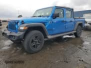 ✅ 2022 Jeep Gladiator Sport • VIN: 1C6HJTAG7NL100980 • Лот: 90792205. Опубликован ранее на Copart с пробегом 27 819 миль. Бесплатный доступ к архиву аукционных продаж из США и подробный отчёт об истории автомобиля на DreamBid. Изображение 1.