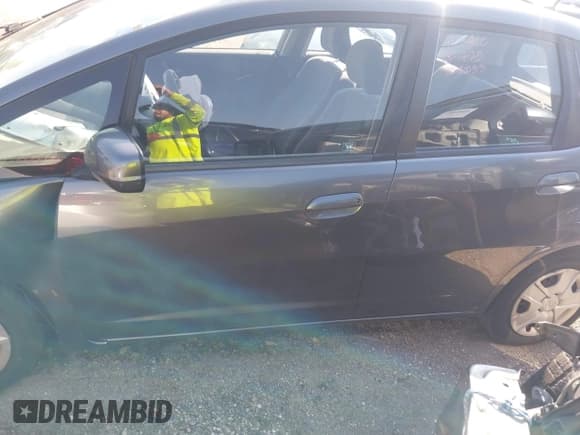 ✅ 2013 Honda Fit • VIN: JHMGE8H33DC029945 • Lot: 42938221. Listed on IAAI with 181,390 mi. Free auction sales archive from the USA and detailed vehicle history report at DreamBid. Image 15.