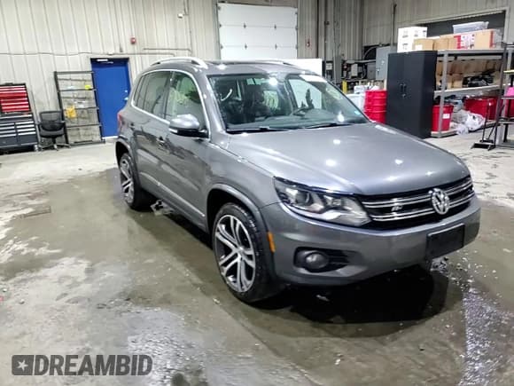 ✅ 2013 Volkswagen Tiguan S • VIN: WVGBV7AX5DW014389 • Lot: 80251545. Listed on Copart with 93,142 mi. Free auction sales archive from the USA and detailed vehicle history report at DreamBid. Image 14.