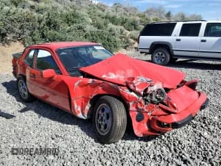 ✅ 1987 Porsche 924 • VIN: WP0AA0929HN453618 • Лот: 57893385. Опубликован ранее на Copart с пробегом 65 615 миль. Бесплатный доступ к архиву аукционных продаж из США и подробный отчёт об истории автомобиля на DreamBid. Изображение 4.