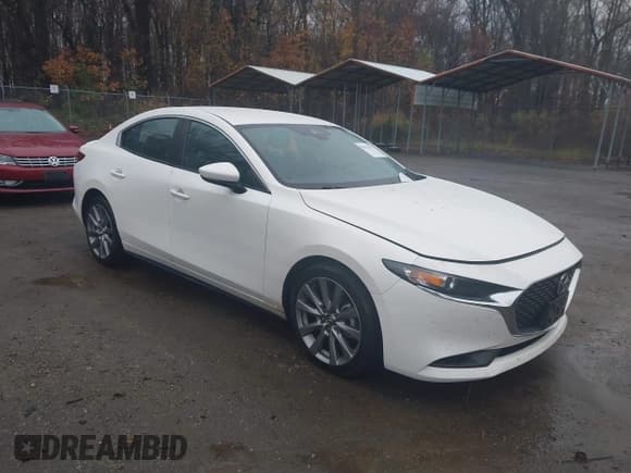 ✅ 2021 Mazda 3 Select • VIN: JM1BPABL4M1319578 • Лот: 43771777. Опубликован ранее на IAAI с пробегом 83 317 миль. Бесплатный доступ к архиву аукционных продаж из США и подробный отчёт об истории автомобиля на DreamBid. Изображение 1.