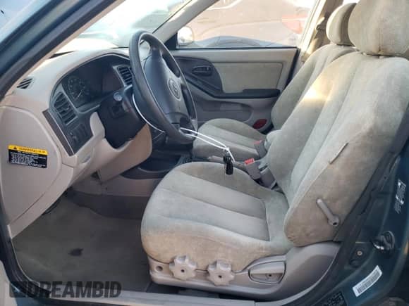 2003 Hyundai Elantra GLS with VIN KMHDN45D83U598594, listed as a Copart auction lot 76713594 with 138,884 mi miles and Salvage title. Bid and sale history available at DreamBid. Image 7.