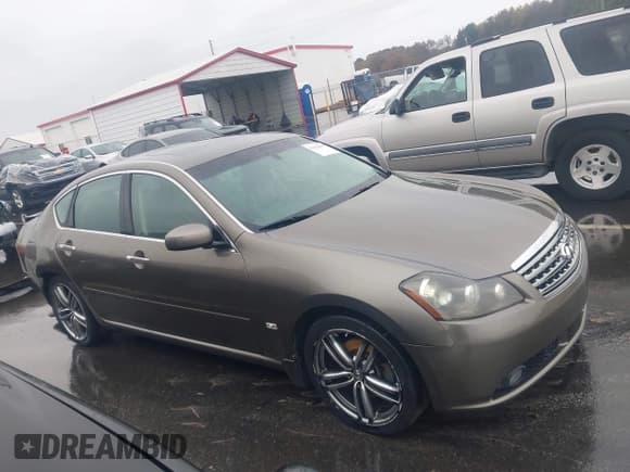 ✅ 2006 Infiniti M • VIN: JNKAY01EX6M116197 • Lot: 43522833. Listed on IAAI with 207,095 mi. Free auction sales archive from the USA and detailed vehicle history report at DreamBid. Image 14.