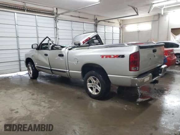 2006 Dodge 1500 SLT с VIN 1D7HU18226S705081, выставлен на аукционе Copart как лот 73956954 с пробегом Не указан миль и Списание • Salvage title. История ставок и продаж доступна на DreamBid. Изображение 2.
