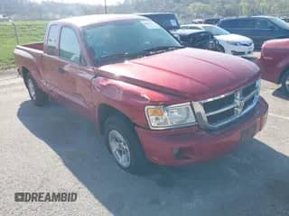 2010 Dodge Dakota z VIN 1D7CE2BK1AS135475, wystawiony jako IAAI lot #41987312 z przebiegiem 100 159 mil mil oraz . Historia ofert i sprzedaży dostępna na DreamBid. Obrazek 1.