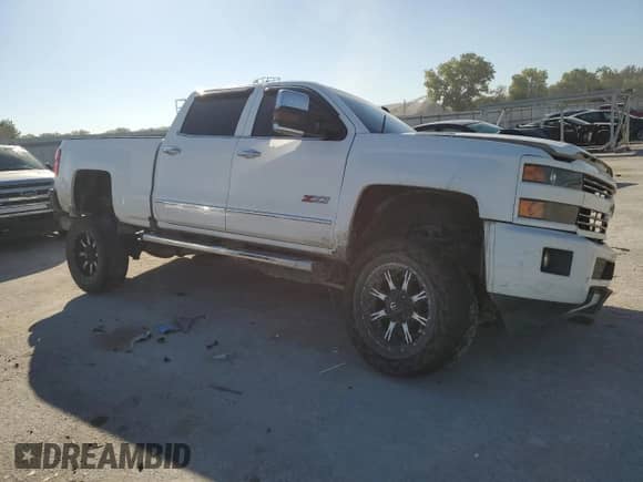 2017 Chevrolet Silverado 3500HD LTZ с VIN 1GC4K0EY8HF108983, выставлен на аукционе Copart как лот 73534014 с пробегом 121 390 миль миль и Списание • Salvage title. История ставок и продаж доступна на DreamBid. Изображение 4.