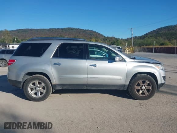 ✅ 2009 Saturn Outlook XR • VIN: 5GZER23DX9J208026 • Lot: 43424566. Listed on IAAI with 233,320 mi. Free auction sales archive from the USA and detailed vehicle history report at DreamBid. Image 13.