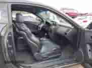 2003 Hyundai Tiburon GT with VIN KMHHN65F53U059705, listed as a IAAI auction lot 43573043 with 165,650 mi miles and . Bid and sale history available at DreamBid. Image 5.