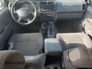 ✅ 2000 Nissan Xterra XE • VIN: 5N1ED28Y8YC513714 • Lot: 64658645. Wystawiony na Copart z przebiegiem 333 877 mil. Bezpłatny archiwum sprzedaży aukcyjnych z USA i szczegółowy raport historii pojazdu na DreamBid. Zdjęcie 8.