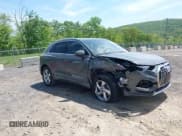 ✅ 2022 Audi Q3 Premium • VIN: WA1AUCF38N1031553 • Lot: 42233049. Listed on IAAI with 18,110 mi. Free auction sales archive from the USA and detailed vehicle history report at DreamBid. Image 1.