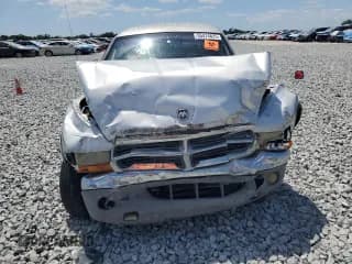 ✅ 2002 Dodge Dakota SLT • VIN: 1B7HL48N32S558742 • Lot: 55474825. Wystawiony na Copart z przebiegiem Nie podano. Bezpłatny archiwum sprzedaży aukcyjnych z USA i szczegółowy raport historii pojazdu na DreamBid. Zdjęcie 5.
