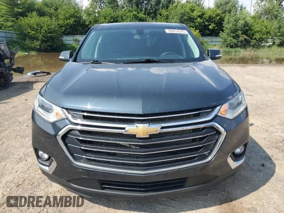 ✅ 2021 Chevrolet Traverse LT Cloth • VIN: 1GNEVGKW5MJ119901 • Лот: 68476525. Опубликован ранее на Copart с пробегом 90 782 миль. Бесплатный доступ к архиву аукционных продаж из США и подробный отчёт об истории автомобиля на DreamBid. Изображение 5.
