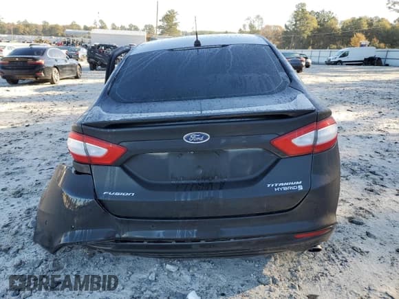 ✅ 2014 Ford Fusion Titanium Hybrid • VIN: 3FA6P0RU3ER349145 • Lot: 92647765. Listed on Copart with 227,428 mi. Free auction sales archive from the USA and detailed vehicle history report at DreamBid. Image 6.