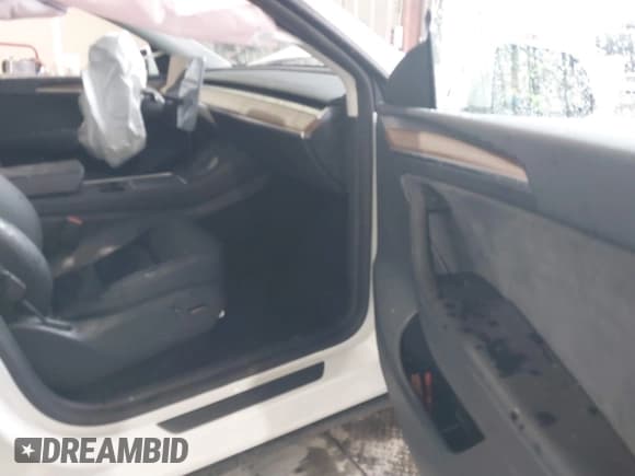 ✅ 2023 Tesla Model Y Long Range • VIN: 7SAYGAEEXPF789037 • Lot: 41551605. Listed on IAAI with 8,630 mi. Free auction sales archive from the USA and detailed vehicle history report at DreamBid. Image 5.