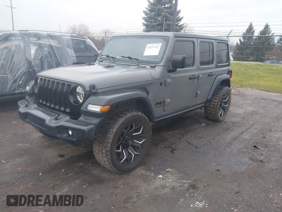 ✅ 2020 Jeep Wrangler Unlimited Sport S • VIN: 1C4HJXDG4LW266509 • Lot: 41217142. Listed on IAAI with 73,569 mi. Free auction sales archive from the USA and detailed vehicle history report at DreamBid. Image 18.
