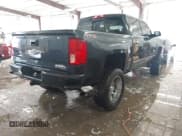 ✅ 2017 Chevrolet Silverado 1500 High Country • VIN: 3GCUKTEJ3HG296721 • Lot: 41609238. Listed on IAAI with 129,811 mi. Free auction sales archive from the USA and detailed vehicle history report at DreamBid. Image 4.