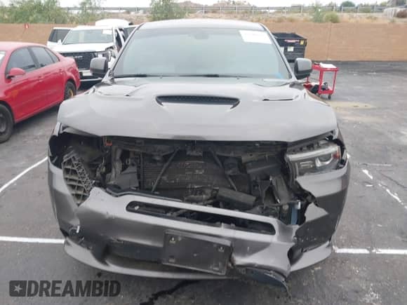 2018 Dodge Durango R/T with VIN 1C4SDHCT8JC100591, listed as a IAAI auction lot 43296025 with 95,326 mi miles and . Bid and sale history available at DreamBid. Image 6.