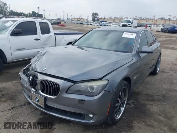 ✅ 2012 BMW 7 Series 740i • VIN: WBAKA4C52CC613676 • Lot: 42509312. Listed on IAAI with 113,971 mi. Free auction sales archive from the USA and detailed vehicle history report at DreamBid. Image 2.