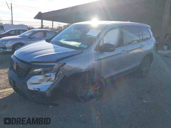 ✅ 2021 Honda Passport EX-L • VIN: 5FNYF8H51MB014349 • Lot: 43733895. Listed on IAAI with 36,679 mi. Free auction sales archive from the USA and detailed vehicle history report at DreamBid. Image 17.