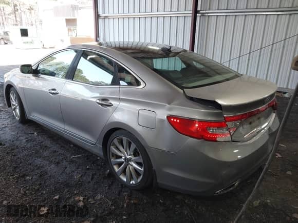 2012 Hyundai Azera с VIN KMHFH4JG9CA184094, выставлен на аукционе IAAI как лот 41478303 с пробегом 131 227 миль миль и . История ставок и продаж доступна на DreamBid. Изображение 3.