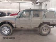 ✅ 1998 Jeep Cherokee Sport • VIN: 1J4FJ68S5WL284937 • Lot: 41984490. Listed on IAAI with 259,716 mi. Free auction sales archive from the USA and detailed vehicle history report at DreamBid. Image 15.