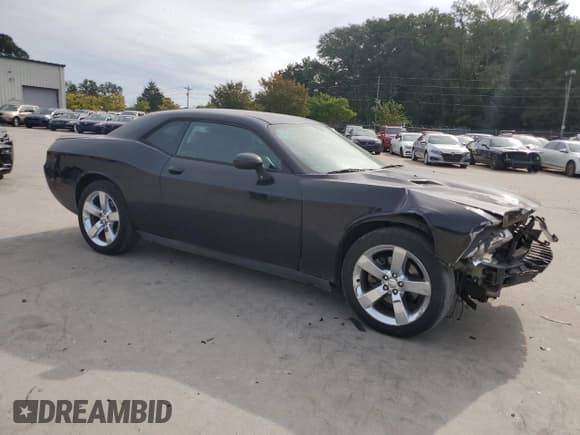 ✅ 2011 Dodge Challenger • VIN: 2B3CJ4DG0BH570315 • Lot: 70276054. Wystawiony na Copart z przebiegiem 181 808 mil. Bezpłatny archiwum sprzedaży aukcyjnych z USA i szczegółowy raport historii pojazdu na DreamBid. Zdjęcie 4.