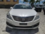 ✅ 2015 Hyundai Azera • VIN: KMHFG4JGXFA468082 • Lot: 69019715. Listed on Copart with 127,984 mi. Free auction sales archive from the USA and detailed vehicle history report at DreamBid. Image 5.