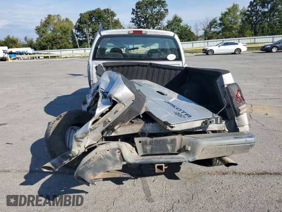 2004 Dodge Dakota Sport с VIN 1D7HG38N34S770063, выставлен на аукционе Copart как лот 71457315 с пробегом 320 703 миль миль и Списание • Salvage title. История ставок и продаж доступна на DreamBid. Изображение 6.