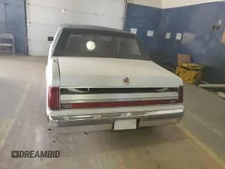 ✅ 1988 Lincoln Town Car • VIN: 1LNBM82F7JY831474 • Lot: 83751464. Listed on Copart with 289,494 mi. Free auction sales archive from the USA and detailed vehicle history report at DreamBid. Image 6.