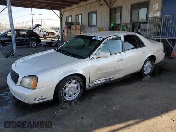 ✅ 2000 Cadillac DeVille • VIN: 1G6KD54Y2YU272566 • Lot: 70886454. Listed on Copart with 152,690 mi. Free auction sales archive from the USA and detailed vehicle history report at DreamBid. Image 1.