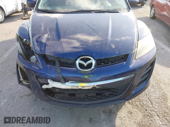 ✅ 2011 Mazda CX-7 i SV • VIN: JM3ER2A52B0354503 • Lot: 43654384. Listed on IAAI with 158,307 mi. Free auction sales archive from the USA and detailed vehicle history report at DreamBid. Image 6.