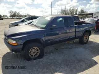 2002 Dodge Dakota z VIN 1B7GG32X42S696990, wystawiony jako Copart lot #76347504 z przebiegiem 226 883 mil mil oraz Szkoda całkowita • Salvage title. Historia ofert i sprzedaży dostępna na DreamBid. Obrazek 1.