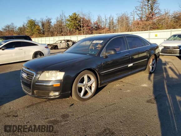 ✅ 2009 Audi A8 4.2L • VIN: WAUMV94E49N008726 • Лот: 90849085. Опубликован ранее на Copart с пробегом 122 074 миль. Бесплатный доступ к архиву аукционных продаж из США и подробный отчёт об истории автомобиля на DreamBid. Изображение 1.