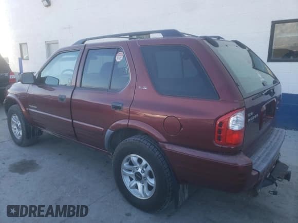 ✅ 2002 Isuzu Rodeo S • VIN: 4S2DM58W824313096 • Lot: 77951364. Wystawiony na Copart z przebiegiem 127 470 mil. Bezpłatny archiwum sprzedaży aukcyjnych z USA i szczegółowy raport historii pojazdu na DreamBid. Zdjęcie 2.