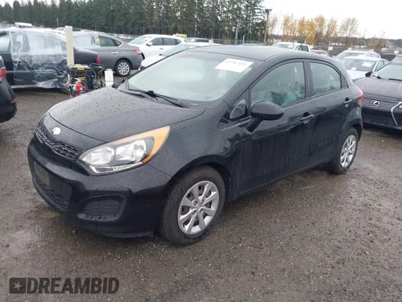 ✅ 2014 Kia Rio LX • VIN: KNADM5A34E6331225 • Lot: 43787453. Listed on IAAI with 135,295 mi. Free auction sales archive from the USA and detailed vehicle history report at DreamBid. Image 2.